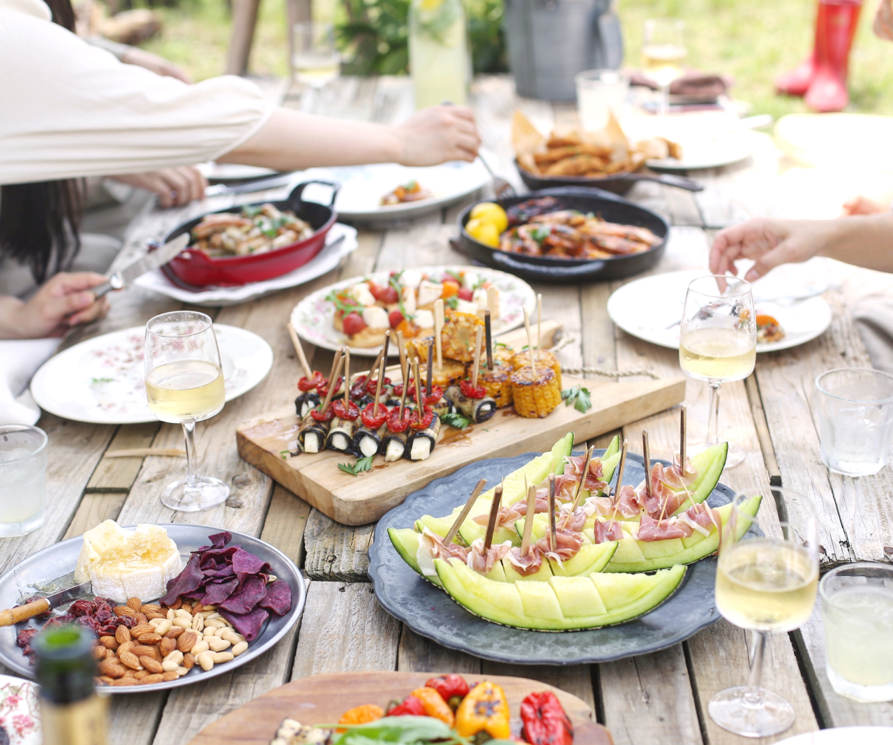Outdoor table set with brunch foods.