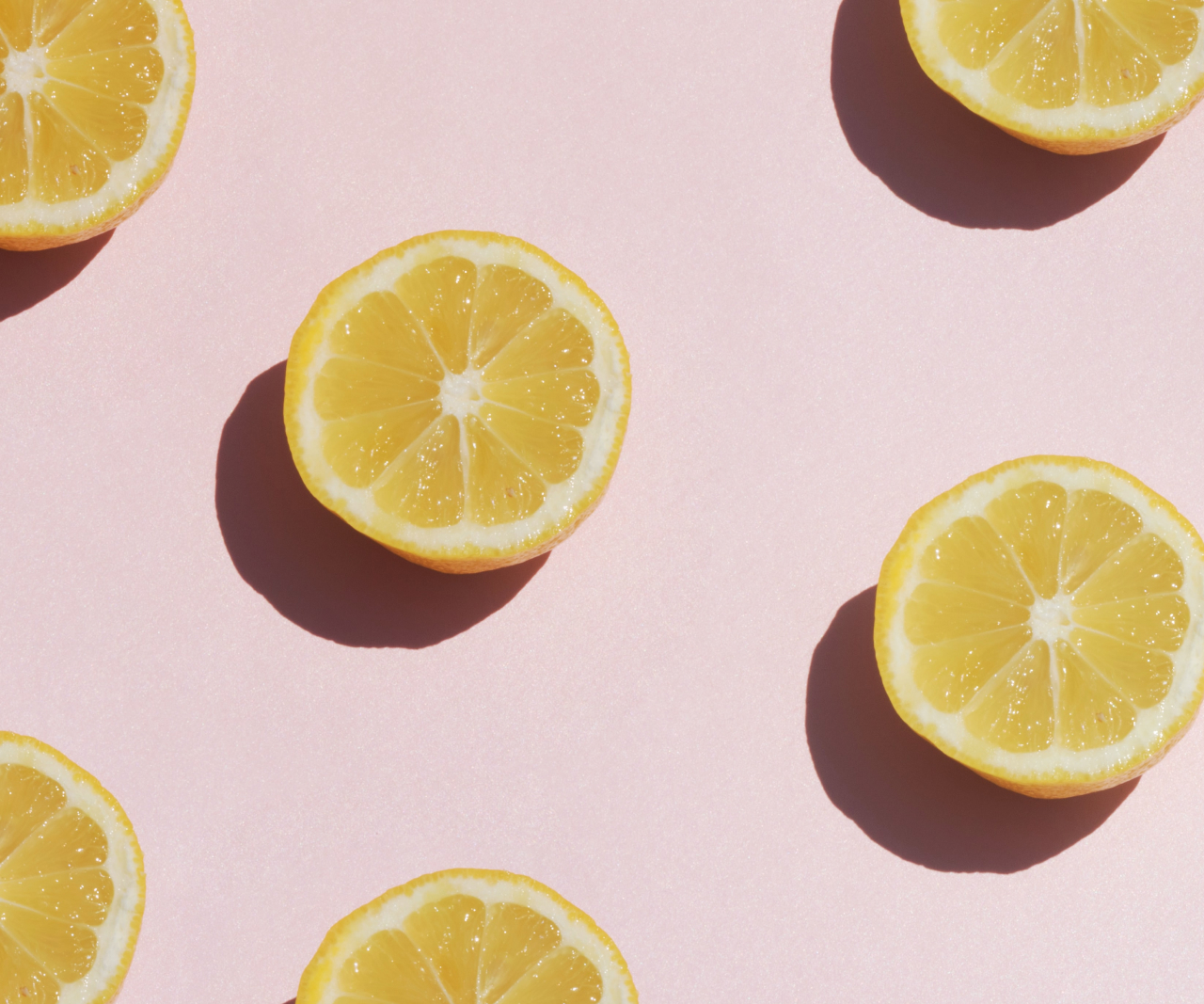 Overhead shot of lemons cut in half.