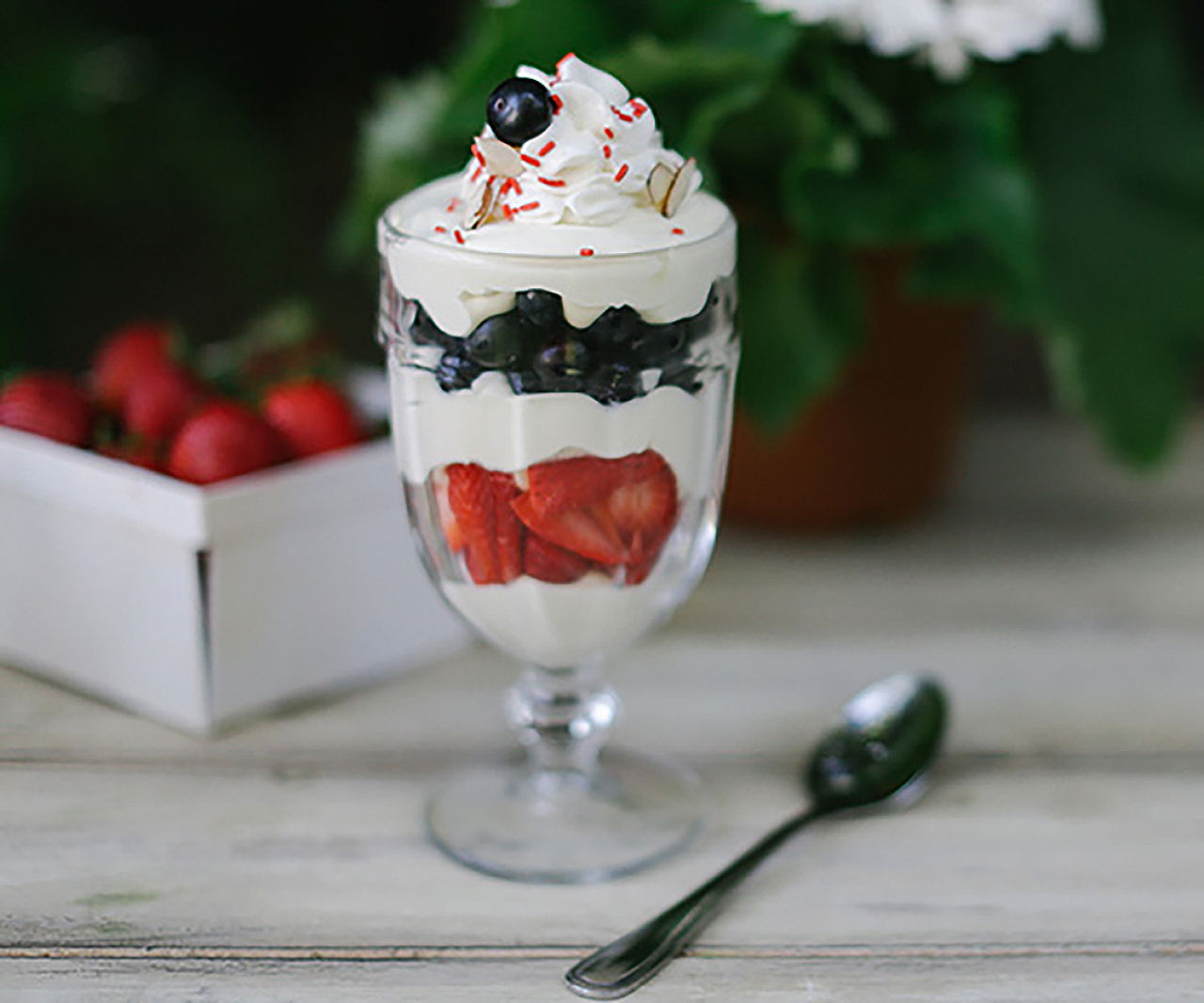 Yogurt parfait with blueberries and strawberries.
