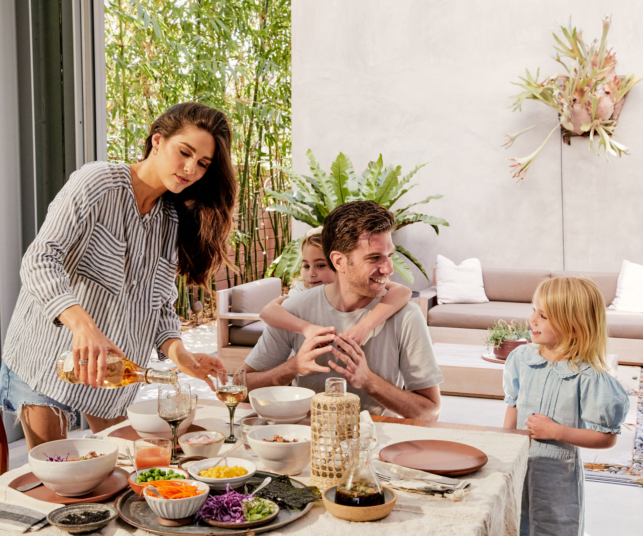 Dini Klein and her family eating together.