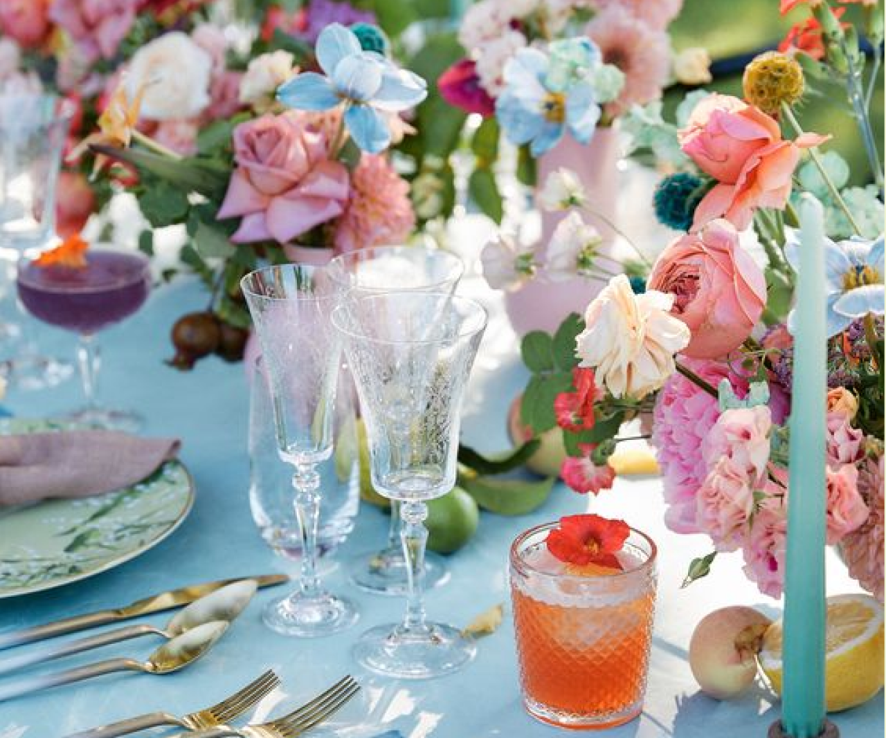 A close-up of a summery dinner table.