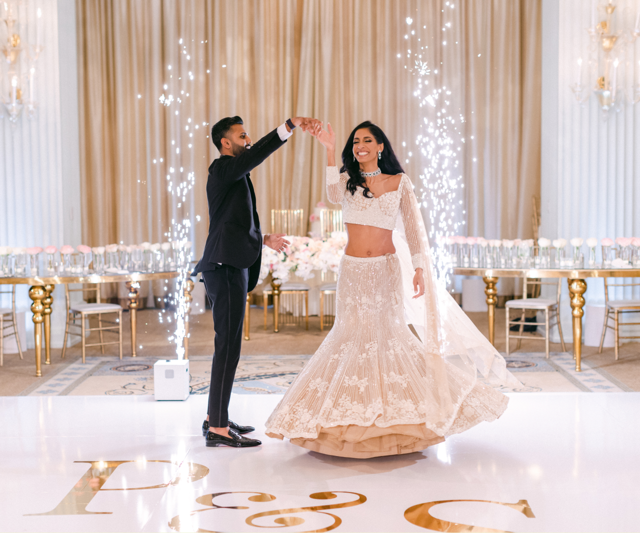 Priya and Sumanth on the dance floor at their post-wedding celebration.
