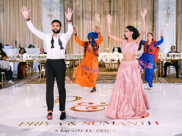 Priya and Sumanth dancing.