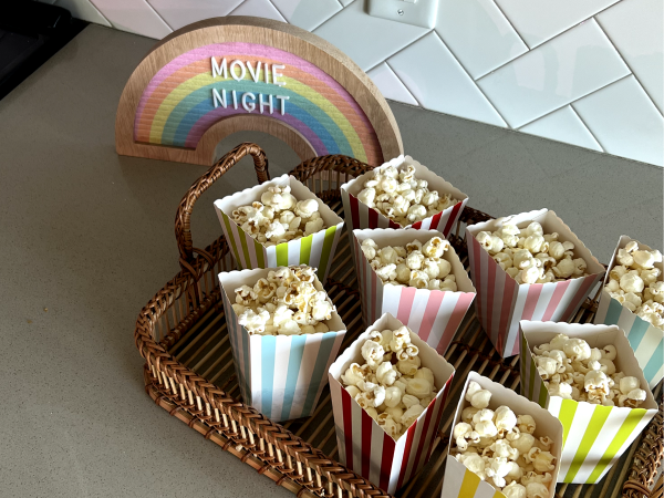 Popcorn in colorful striped boxes.