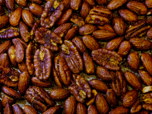 A close-up of a tray of pecans.