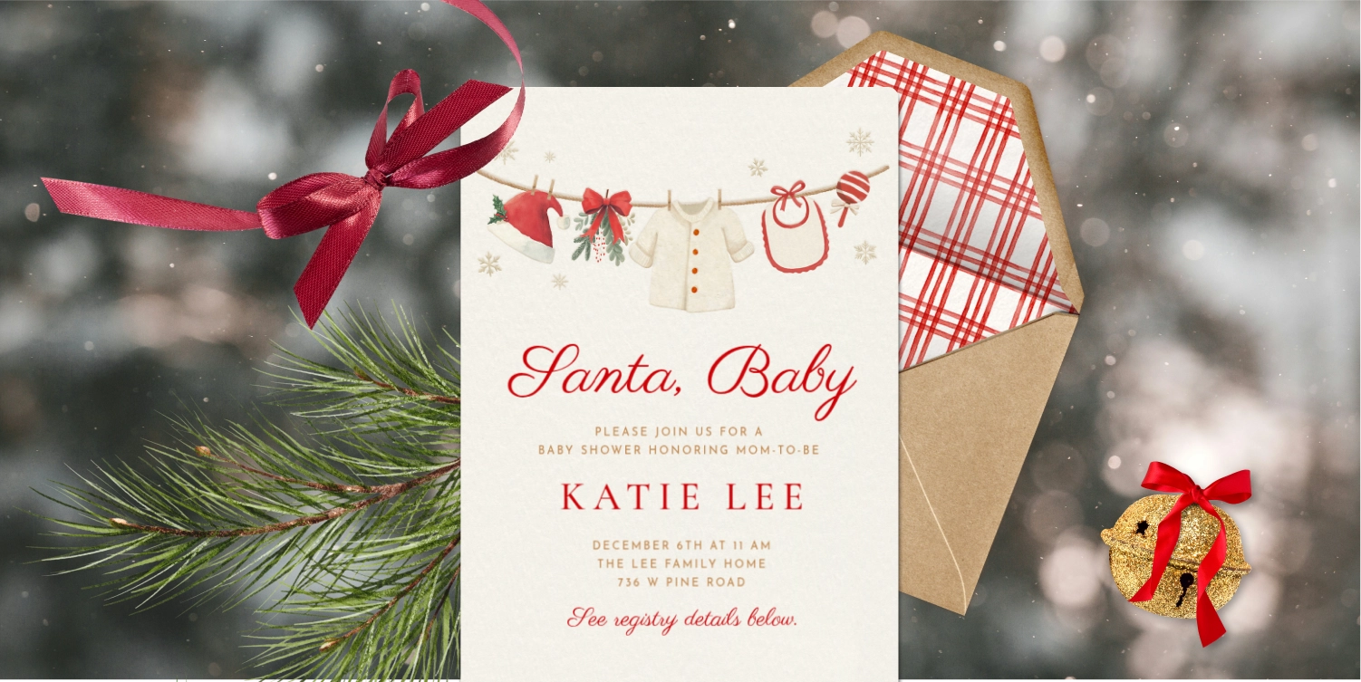 A cream Invitation with an illustration of a clothesline with a white baby coat, a bib, a rattle, and a Santa hat hanging from it. 
