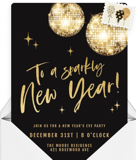 A black Invitation with sparkly gold disco balls and glittery text. 
