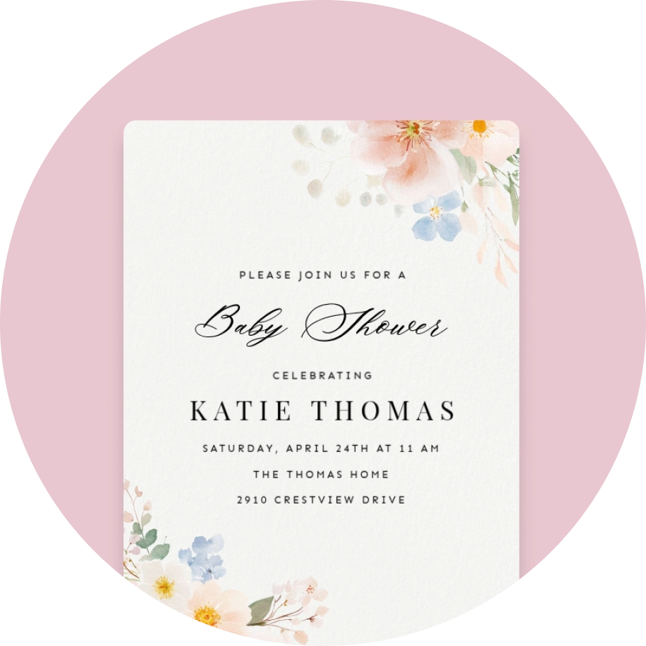A white Invitation with pastel watercolor flowers in the corners. 