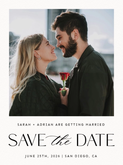 A photo Save the Date Invitation with a picture of a couple holding a red rose.