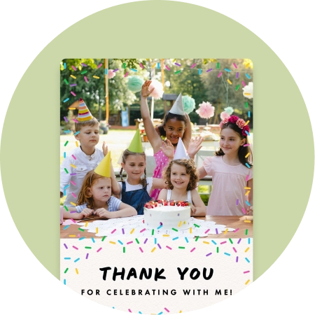 An upload-your-own photo thank you card featuring the words "Thank you for celebrating with me!" on the bottom half of the card. The text is surrounded by colorful sprinkles that bleed up into the top half of the card, where there is a photograph of children at a birthday party smiling over a cake.
