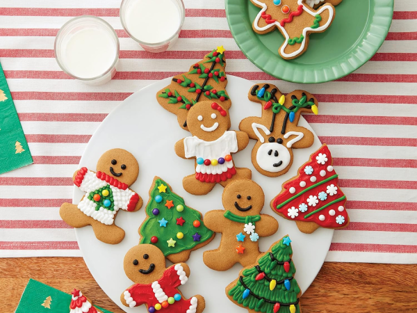 Plate of gingerbread cookies from a pre-made kit.