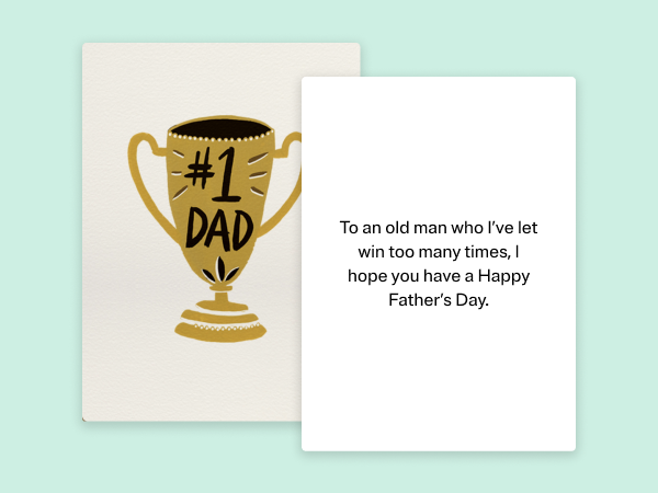 A greeting card with a trophy that says"#1 Dad" on it.